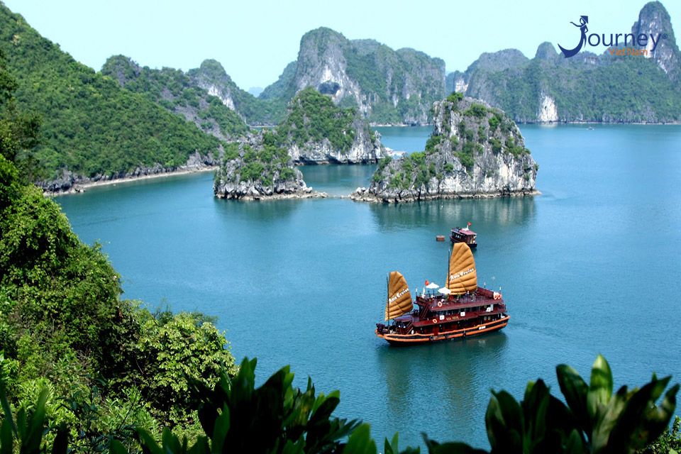 Enjoy the natural beauties of Halong Bay from the window of cruise cabin