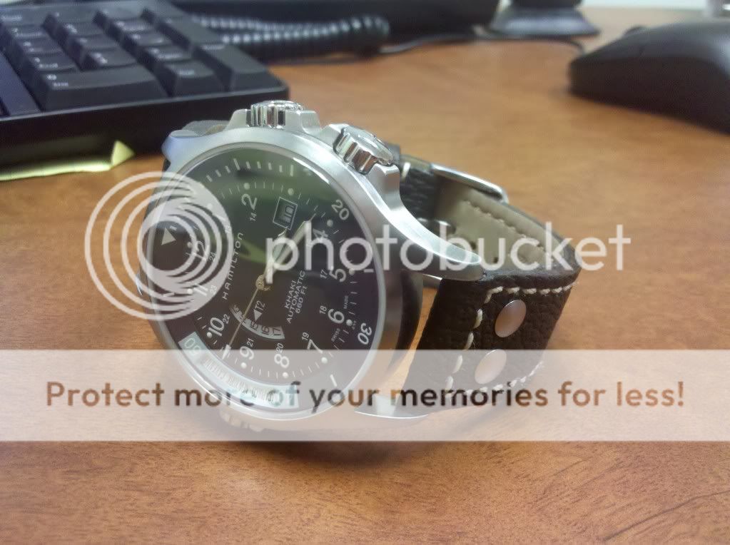 blue face watches with brown leather bands